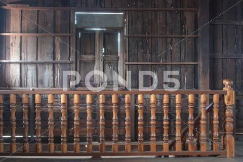 All wood curved staircase with detail close up. Stock Photos