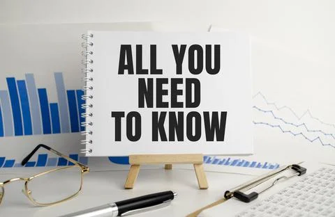 All you need to know, text on white paper on the light background with charts Stock Photos