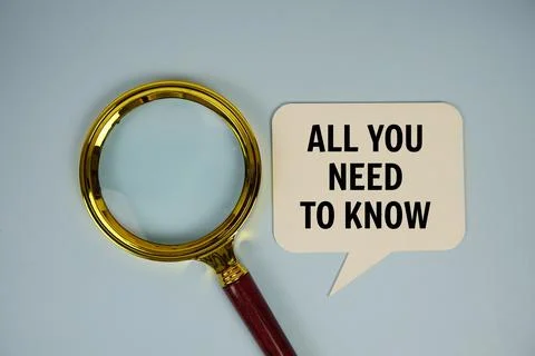 All you need to know text on speech bluble with magnifying glass top view o.. Stock Photos