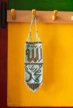 Allah Muhammad calligraphy made from tiny beads hanging on a cabinet. Foto stock