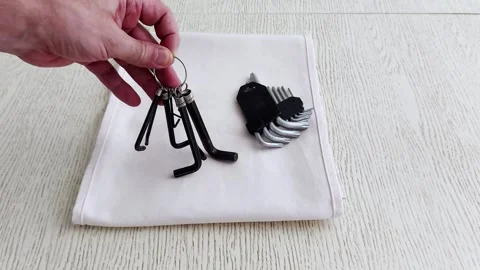 Allen Keys Rest on Soft Cloth: A Quiet Moment of Tool Precision 스톡 동영상 314491833