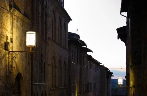 The alleys in the evening in the medieval town of San Gimignano Stock Photos