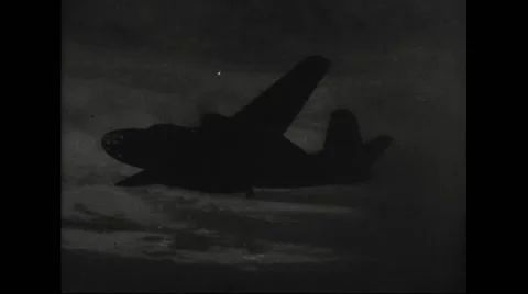 Allied Boeing B-17 flying and bombing on German coastal defences Stock Footage