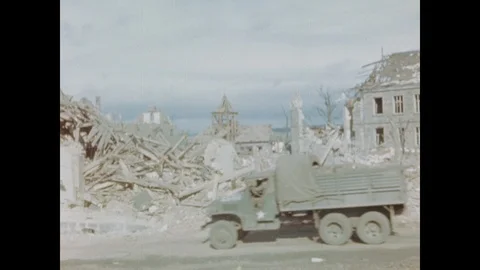 Allied jeeps drive through devastated German town Stock Footage 103377687