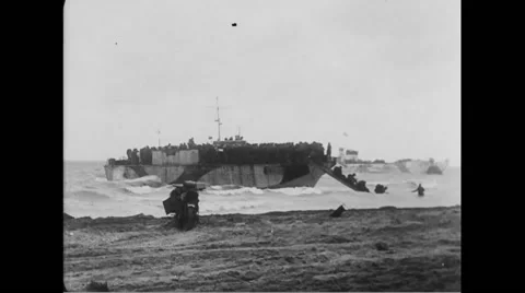 Allied soldiers landing on beach at Normandy Stock Footage