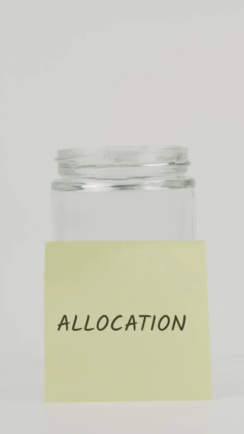 Allocation text or word on yellow sticky note attached to glass jar Stock Footage 311677078