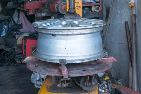 Alloy Wheel on remove the wheel machine Stock Photos