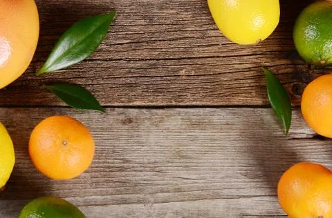 Allsorts from a citrus on wooden background Stock Photos