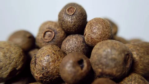Allspice in closeup, looping 360 macro video Stock Footage 129801529