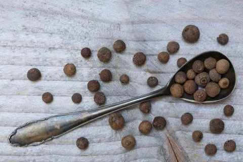 Allspice on a spoon macro Stock Photos