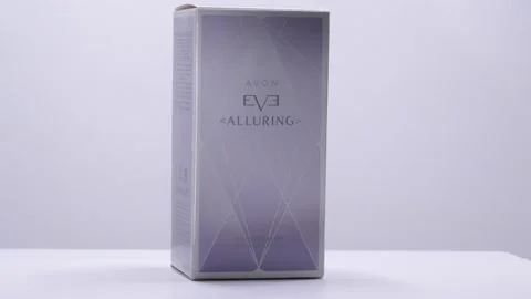 Alluring by Avon Box with Perfume bottle rotation in studio Stock-Footage 171631918