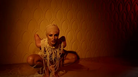 Alluring dance performer lady is dancing alone in night in oriental harem Видео 169851918