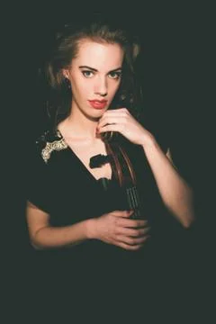 Alluring Female Cellist Holding a Cello Instrument Stock Photos
