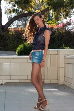 Alluring hosiery in courtyard. Stock Photos