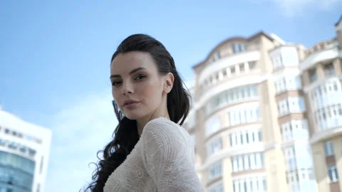Alluring woman is looking at camera Stock Footage 92025695