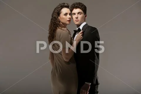 Alluring young lady with her loving boyfriend Stock Photos