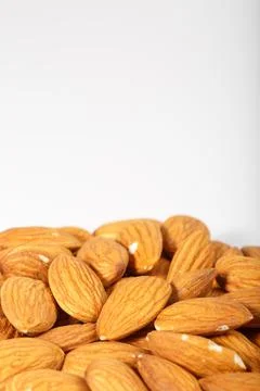 Almond. Almonds on a white background. Dried almonds. Stock Photos
