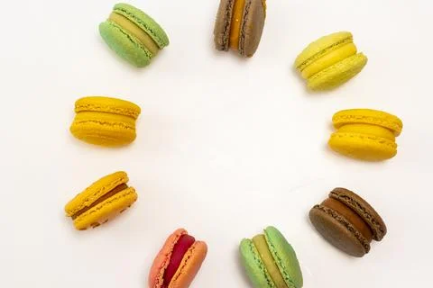 Almond biscuits on a white background. View from above. Almond cookies lie in Stock Photos