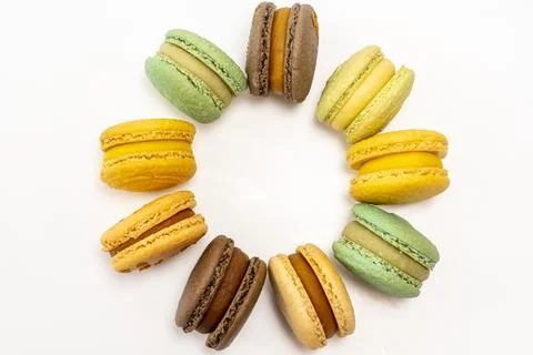 Almond biscuits on a white background. View from above. Macaroons lie in a ci Stock Photos