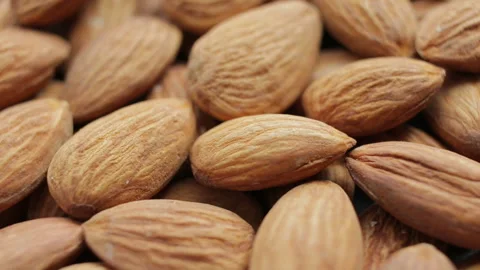 Almond closeup. Rotating nuts background Stock Footage 106380230