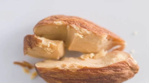 Almond Cracked Shell With Nutmeat Close-Up Stock Footage 338264887