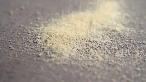 Almond flour flakes falling on a kitchen cloth Vidéo 259955016