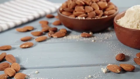 Almond flour with whole nuts Video stock 169938134