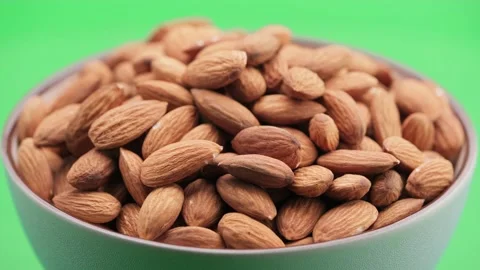 Almond nut close-up, angle view, green screen background, chroma key. Stock Footage 154761011