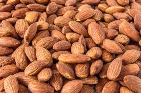 Almond nuts background Stock Photos