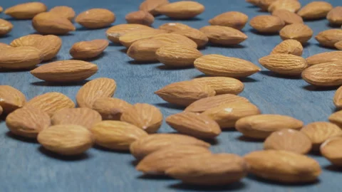 Almond nuts on blue Stock Footage 146268422