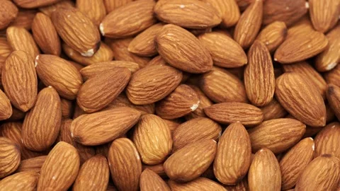 Almond nuts close up rotate in a circle. Stock Footage 238836796