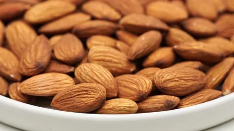 Almond nuts close up rotate in a circle. Stock Footage 238836943