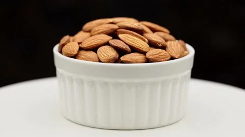 Almond nuts close up rotate in a circle. Stock Footage 238837329