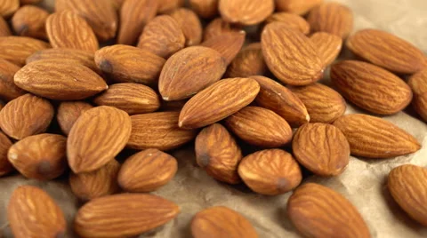 Almond rotating on parchment. Seamless loopable. Prores 4K Stock-Footage 67352757