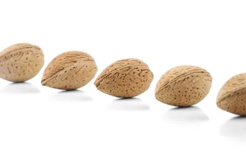 Almond in shell on white background Stockfoto's