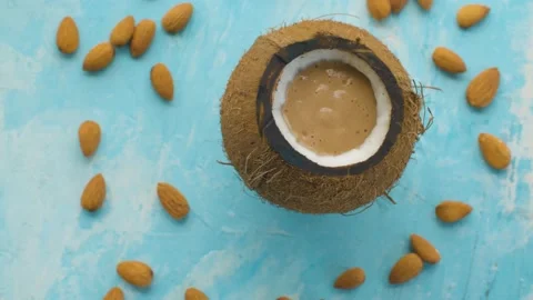Almond smoothie in coconut Stock Footage 137050959