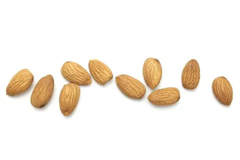 Almond on white Fotos de archivo