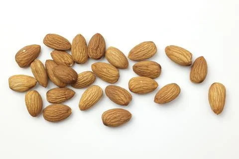Almond on white Stockfoto's