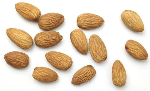 Almond on white Fotos de archivo