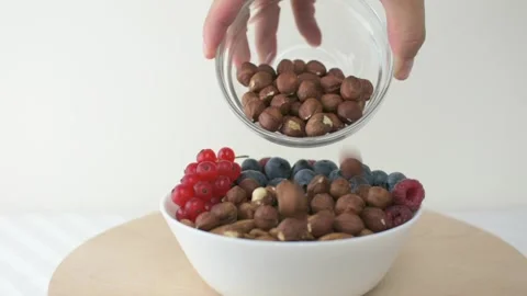 Almonds and hazelnuts Stock Footage 249739960