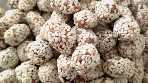 Almonds and hazelnuts in sesame Stockbeeldmateriaal 156311546