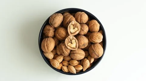 Almonds and walnuts Stock Photos