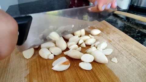Almonds are chopped with a knife Stock Footage 250523675