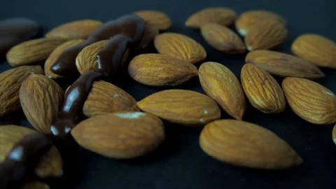 Almonds are filled with chocolate Stock Footage 147255469