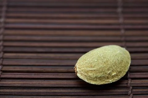 Almonds on a bamboo mat Stock Photos