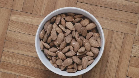 Almonds in a bowl ZOOM Stock Footage 124591729