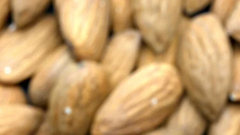 Almonds bunch closeup top view rack focus Stock Footage 105975380
