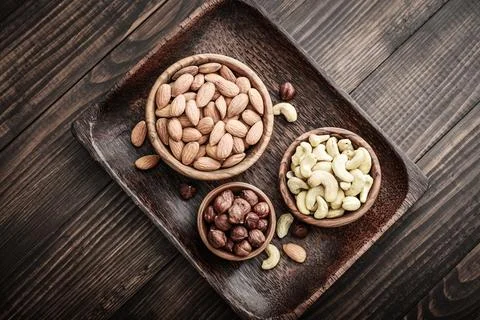 Almonds, cashew and hazelnuts Stock Photos