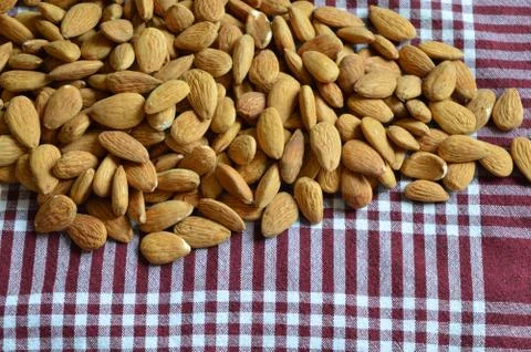Almonds on a checkered background Stock-Fotos