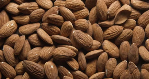 Almonds close up studio shot over rotating Video stock 324837030